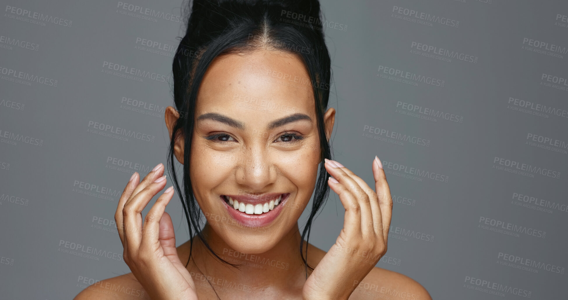 Buy stock photo Face, skincare and hands of happy woman in studio isolated on a gray background. Portrait, natural beauty and model touch in spa facial treatment for aesthetic, glow and cosmetic wellness for health