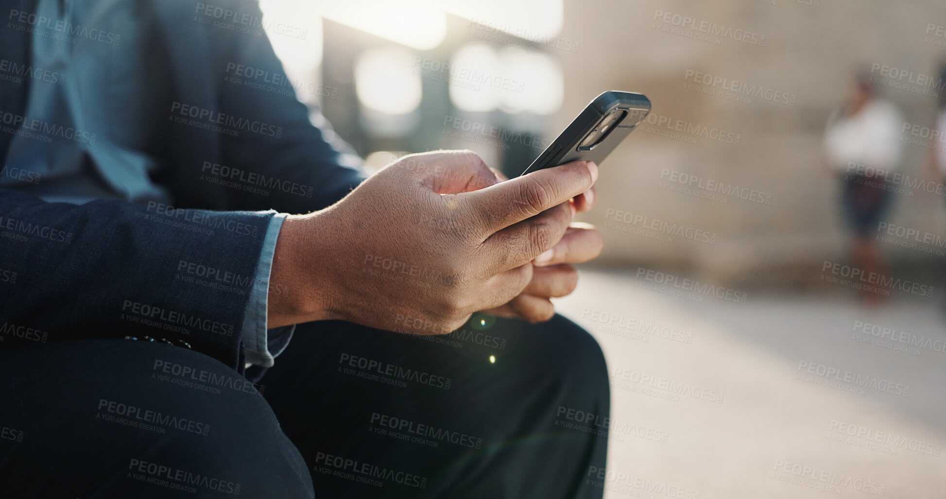 Buy stock photo Hands, phone and closeup of businessman in the city networking on social media, mobile app or internet. Technology, typing and professional male person on website with cellphone in urban town.