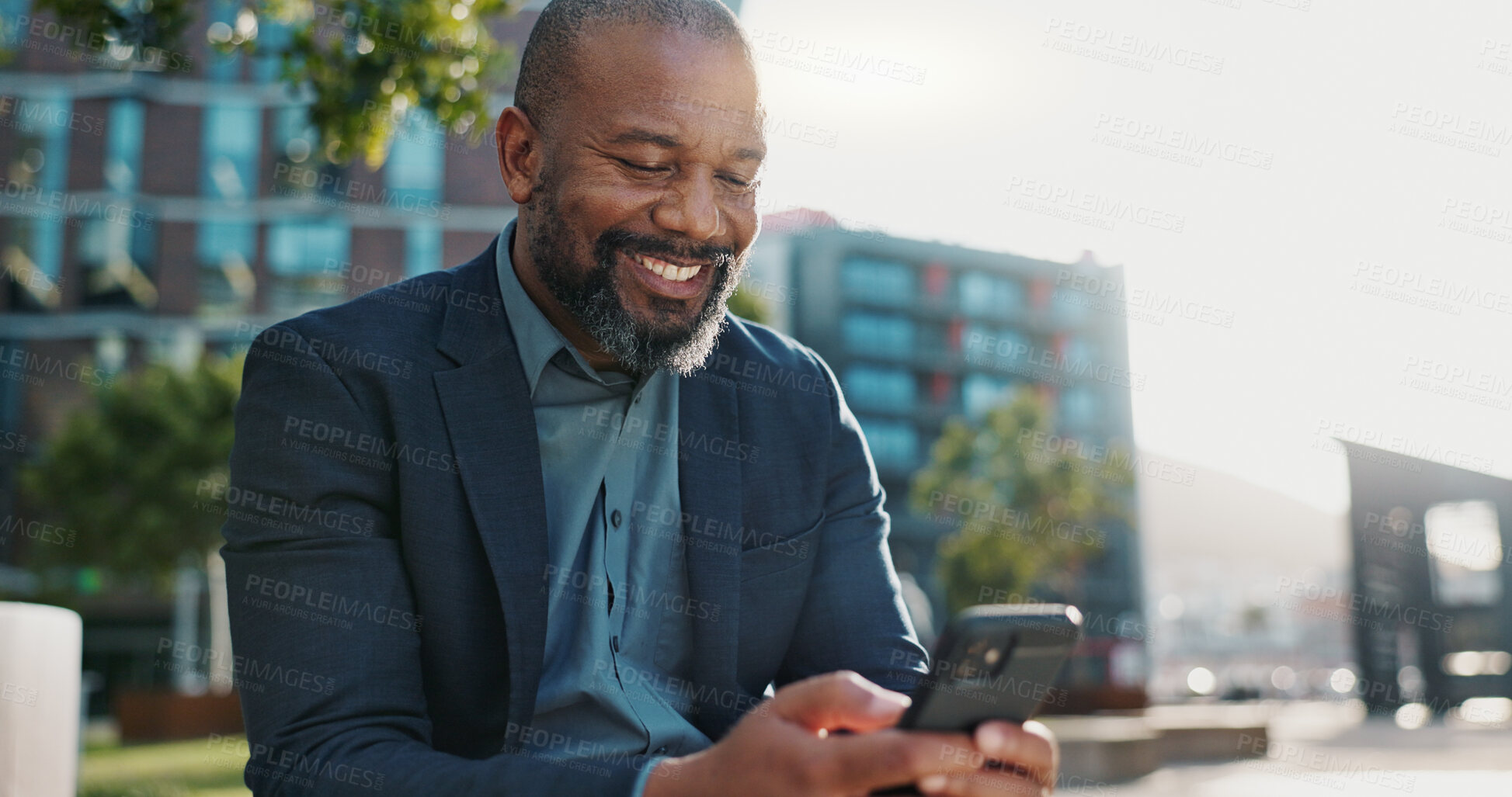 Buy stock photo Smile, phone and African businessman in the city networking on social media, mobile app or internet. Technology, typing and professional male person scroll on website with cellphone in urban town.