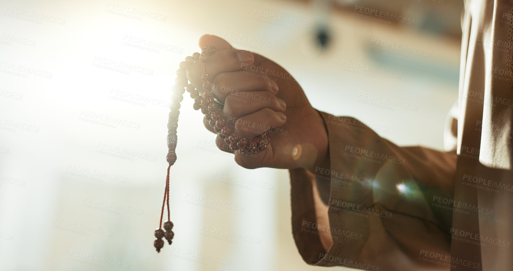 Buy stock photo Muslim, prayer beads and hand of man in mosque with tasbih for spiritual, meditation and mindfulness in religion. Counting, dhikr and person praying in Islam, faith with hope in God in the morning