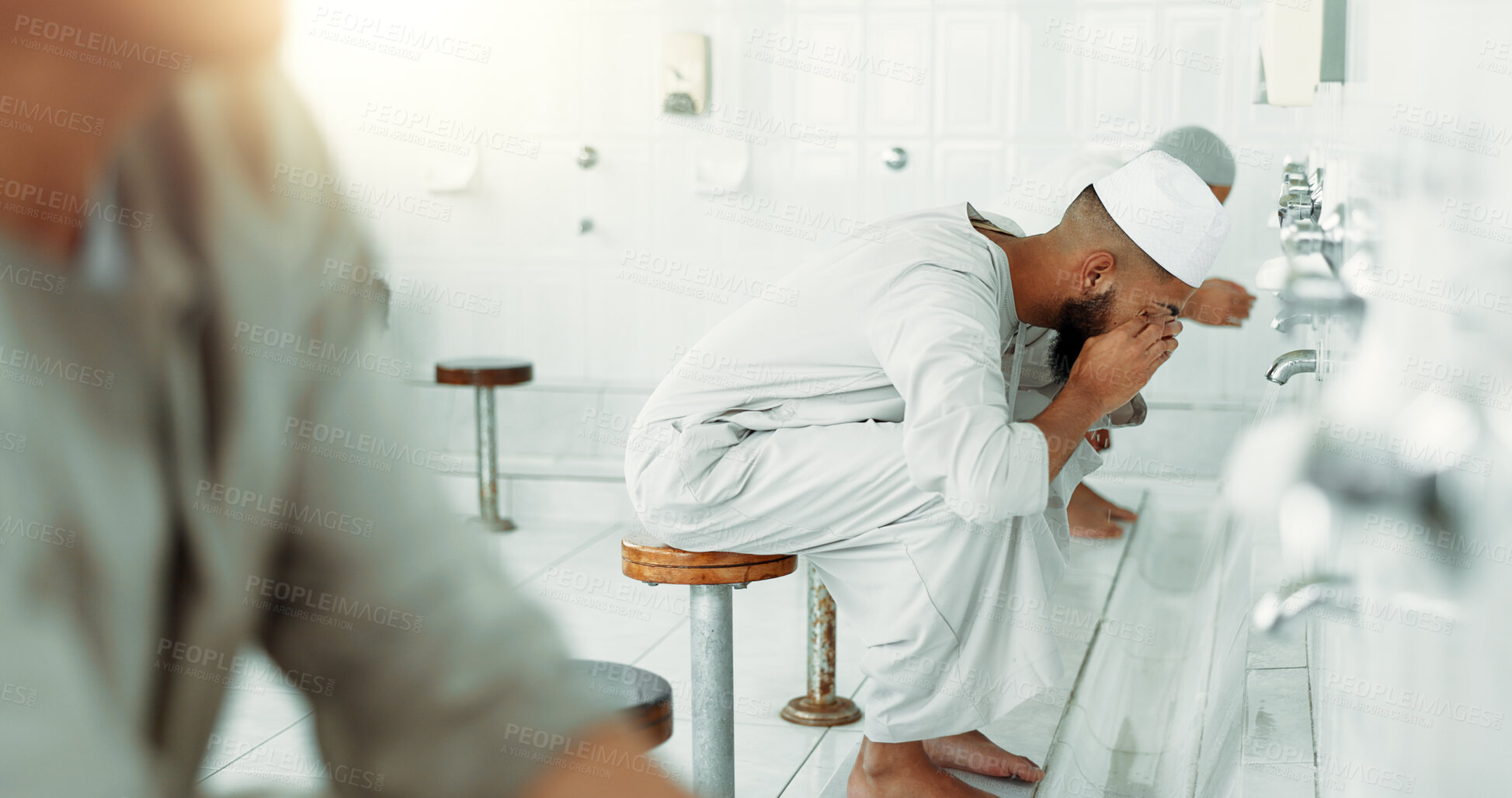 Buy stock photo Muslim, religion and men washing before prayer in bathroom for purity, and cleaning ritual. Islamic, worship and faith of group of people with wudu together at a mosque or temple for holy practice