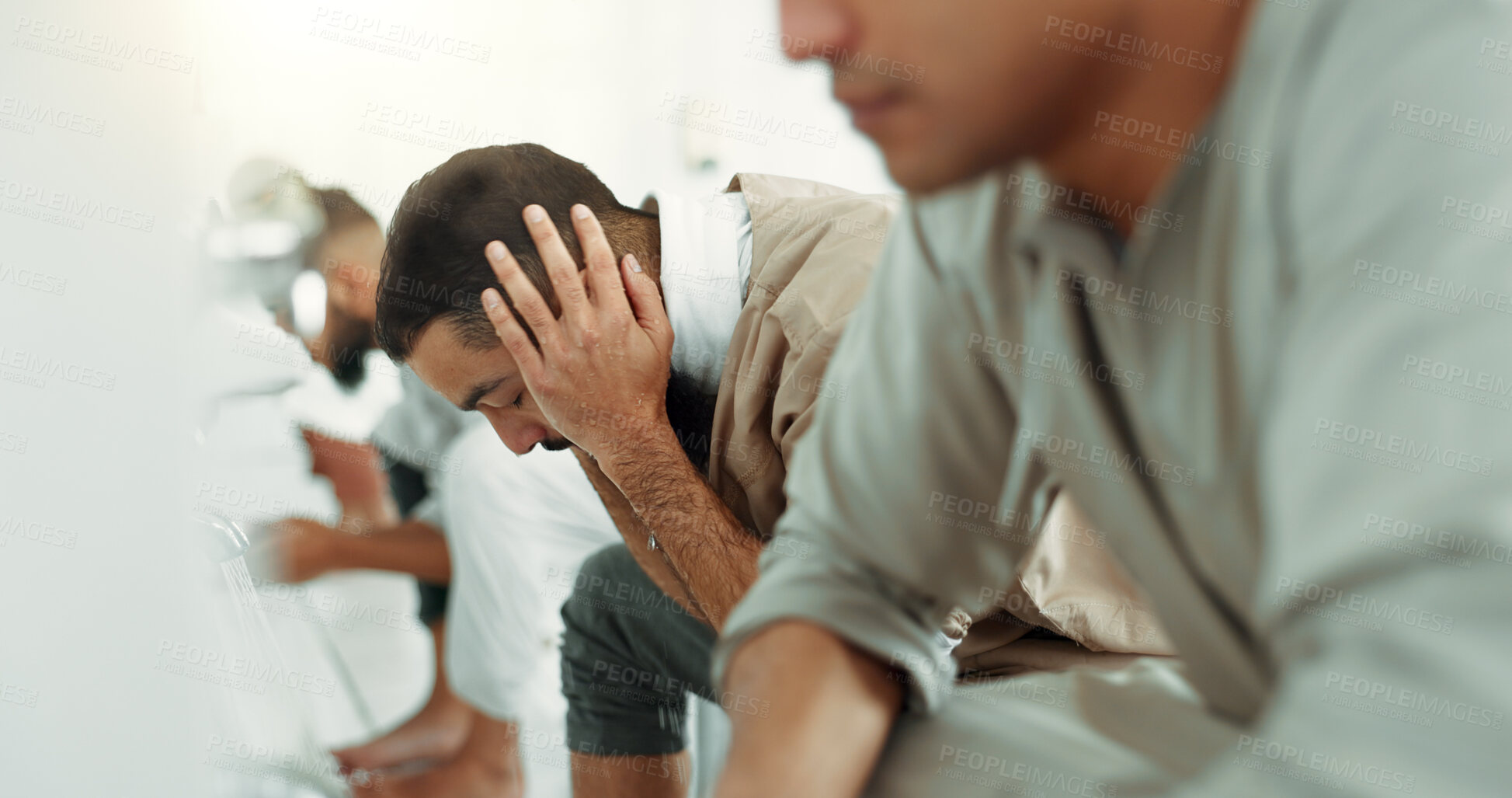 Buy stock photo Muslim, religion ritual and men washing before prayer in bathroom for purity, and cleaning. Islamic, worship and faith of group of people with wudu together at a mosque or temple for holy practice