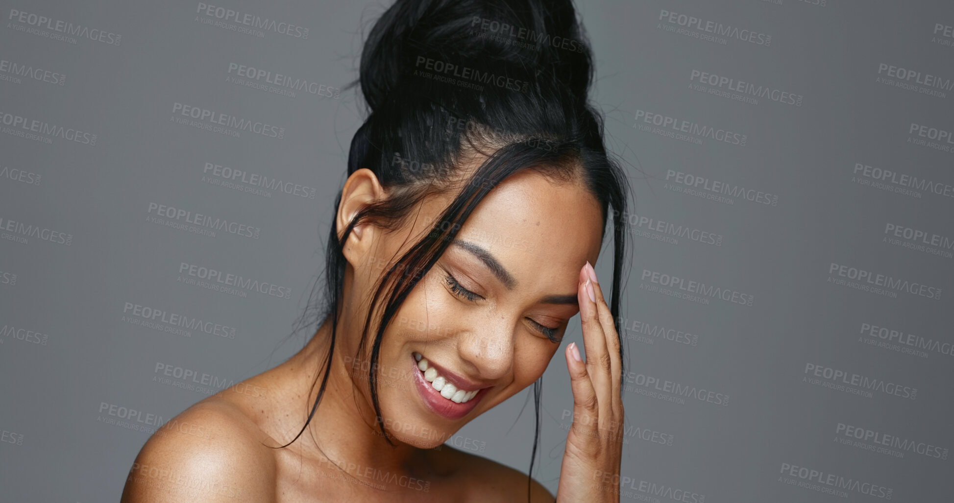 Buy stock photo Face touch, skincare and smile of woman in studio isolated on gray background. Portrait, natural beauty and hand of model in spa facial treatment for aesthetic, glow and cosmetic wellness for health