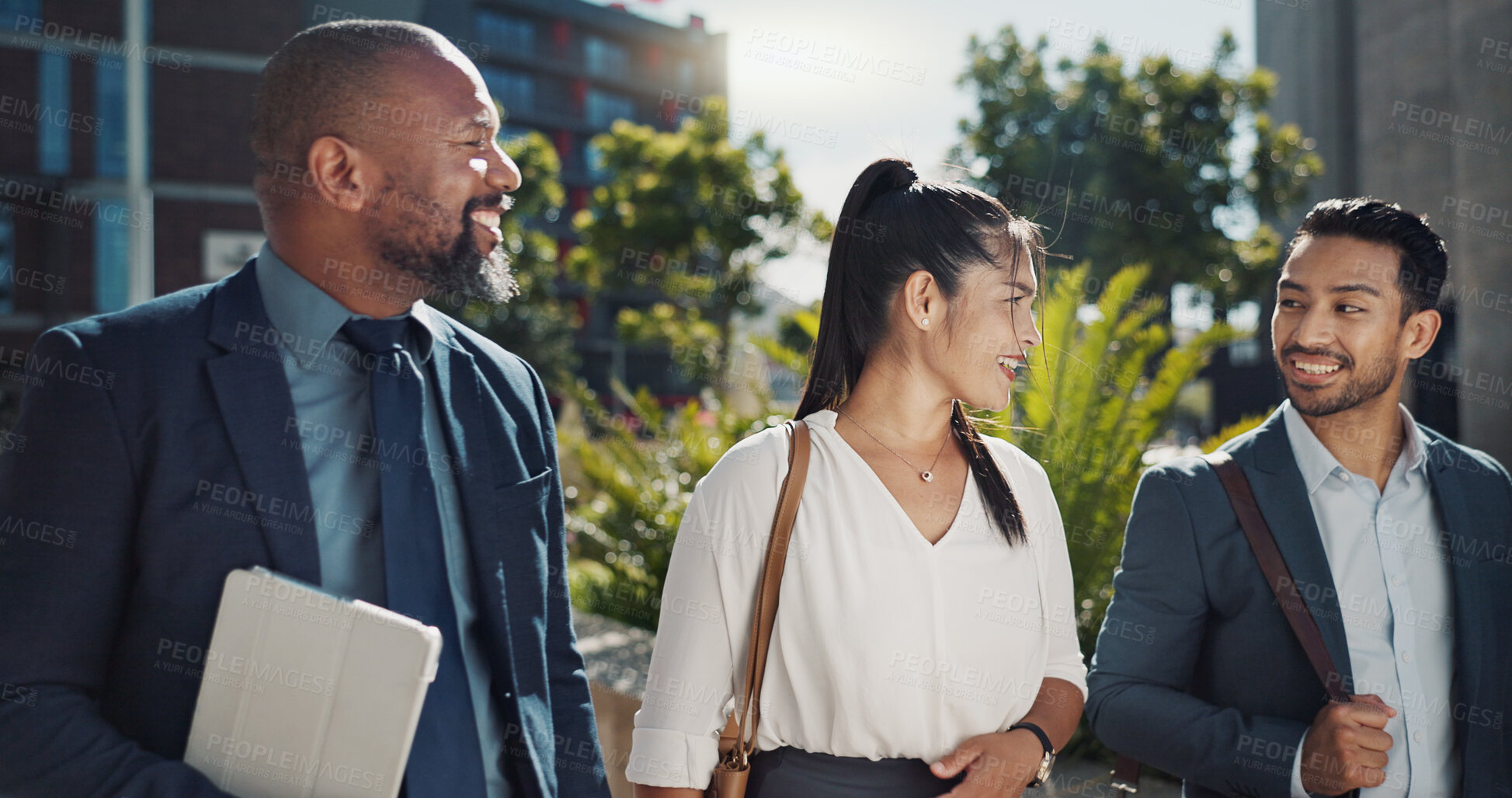 Buy stock photo Business people, walking and travel in city with talking on morning commute, partnership and happy. Employees, men and woman with conversation, collaboration and networking outdoor in urban town