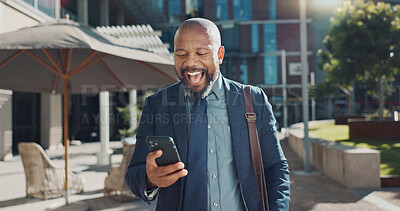 Business man, phone and celebration in city for profit, success or investment revenue on fintech. African professional person, smartphone and winner for cheers, smile or bonus in stock market trading