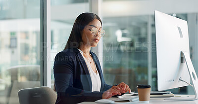 Research, thinking or businesswoman with computer for an article post or networking in office. Digital agency, tech startup or social media manager typing online or planning for update on website