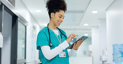 Medical, tablet or surgeon typing for research on social media to for medicine news online in hospital. Woman doctor reading, scroll or healthcare nurse browsing on technology for telehealth services
