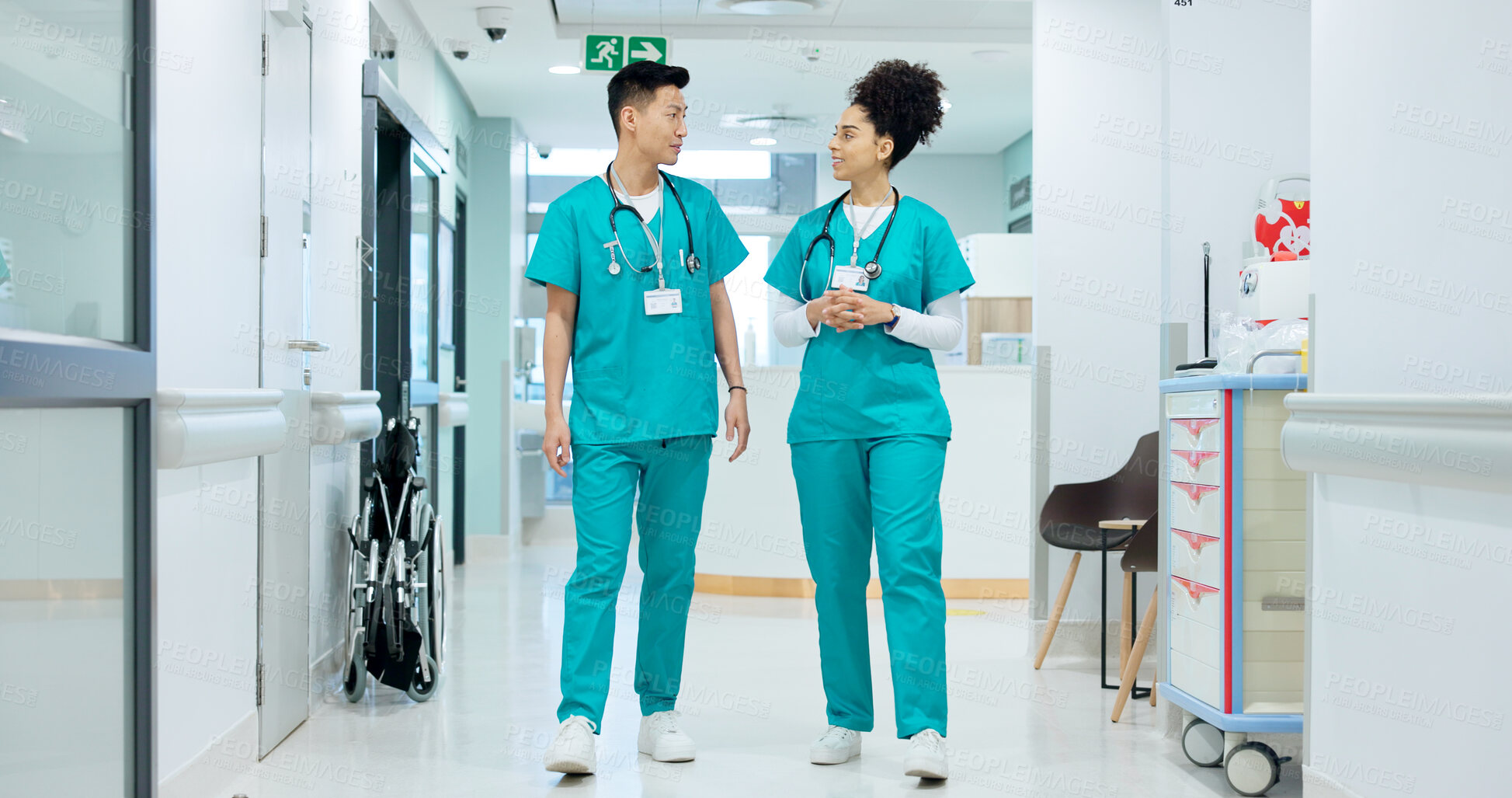 Buy stock photo Hospital, nurse and people in corridor walking, talking and in discussion for advice, care and help. Healthcare, nursing team and man and woman speaking for medical service, diagnosis and consulting