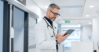 News, tablet or mature doctor in hospital with research on website to search for medicine info online. Man reading, senior or medical healthcare nurse browsing on technology for telehealth in clinic