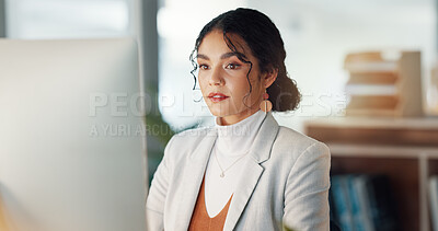 Businesswoman at desk with computer, thinking or typing email, report or article at digital agency. Internet, research and happy woman at tech startup with online review, networking project and smile