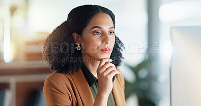 Girl at computer in office, thinking and reading email report, feedback review or article at digital agency. Internet, research and woman at tech startup networking, writing schedule or admin project