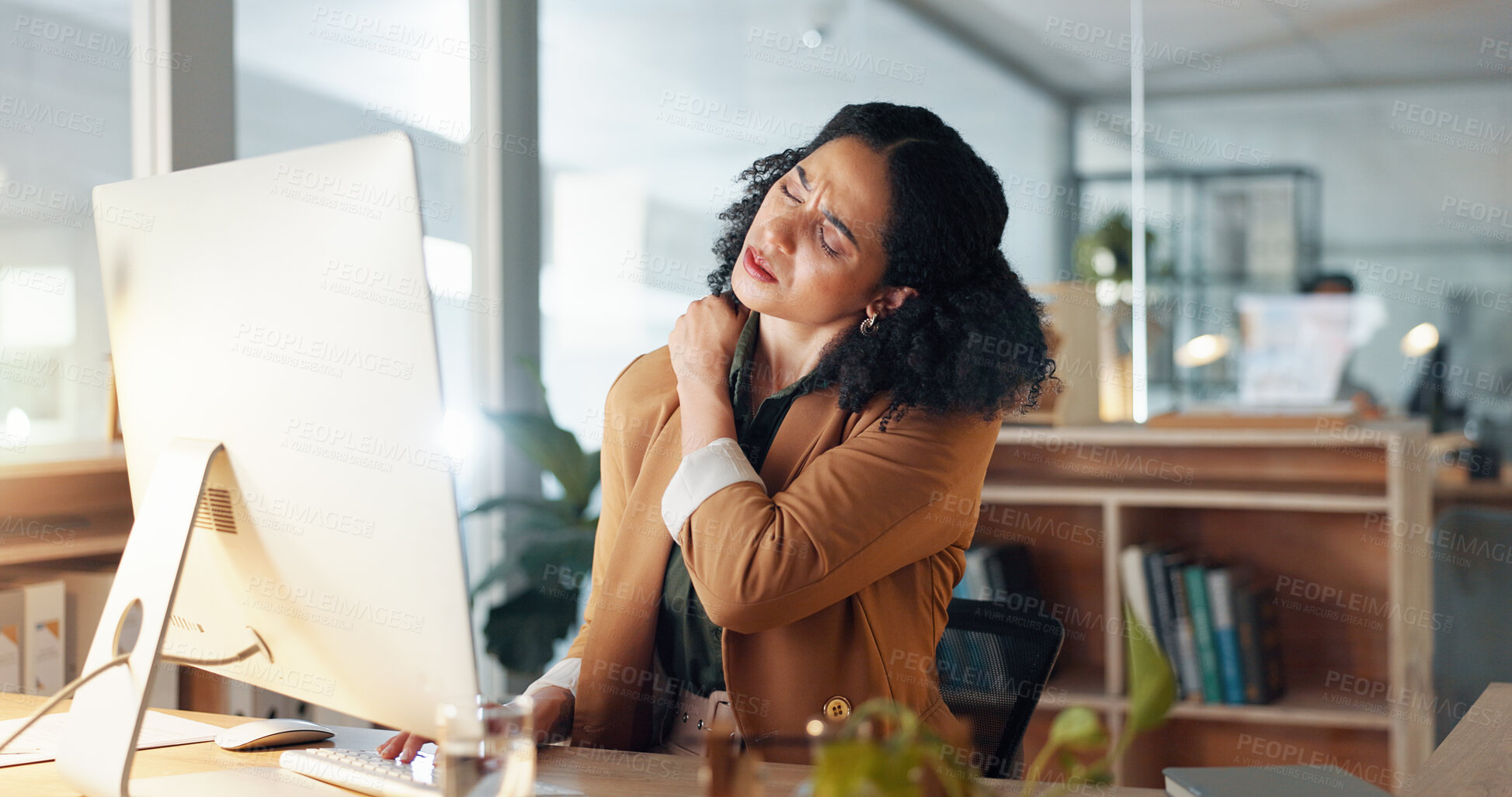 Buy stock photo Woman, neck and hand is sore, office and ache or cramp, laptop and business or pain. Businesswoman, injury and entrepreneur of startup, massage and arthritis or frustrated, fatigue and workplace