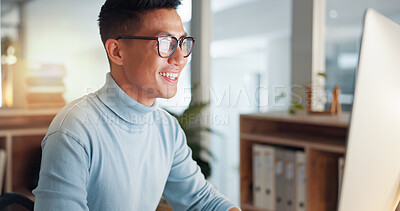 Asian man at computer, glasses and ideas, thinking and reading email, web review or article at digital agency. Research, reflection and businessman at tech startup networking on business website.