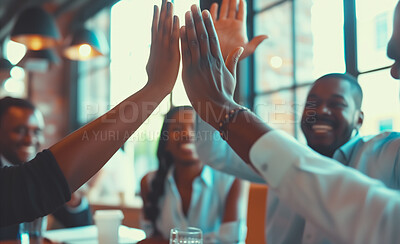 Group, high five and business people in an office for collaboration, teamwork and corporate success. Confident, team and executive sitting together for support, strategy and leadership in workplace