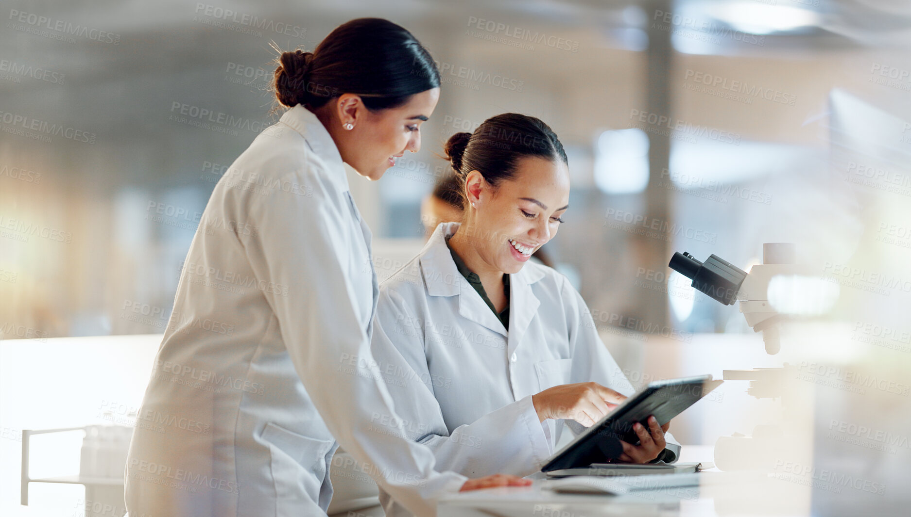 Buy stock photo Scientist, women and teamwork on tablet and computer for laboratory advice, medical research and night planning. Students, science people or mentor on digital technology of test results or comparison