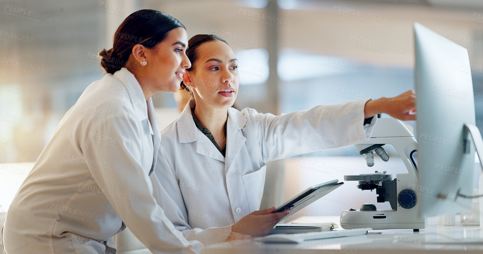 Buy stock photo Scientist, women and teamwork on tablet and computer for laboratory advice, medical research and night planning. Students, science people or mentor on digital technology of test results or comparison