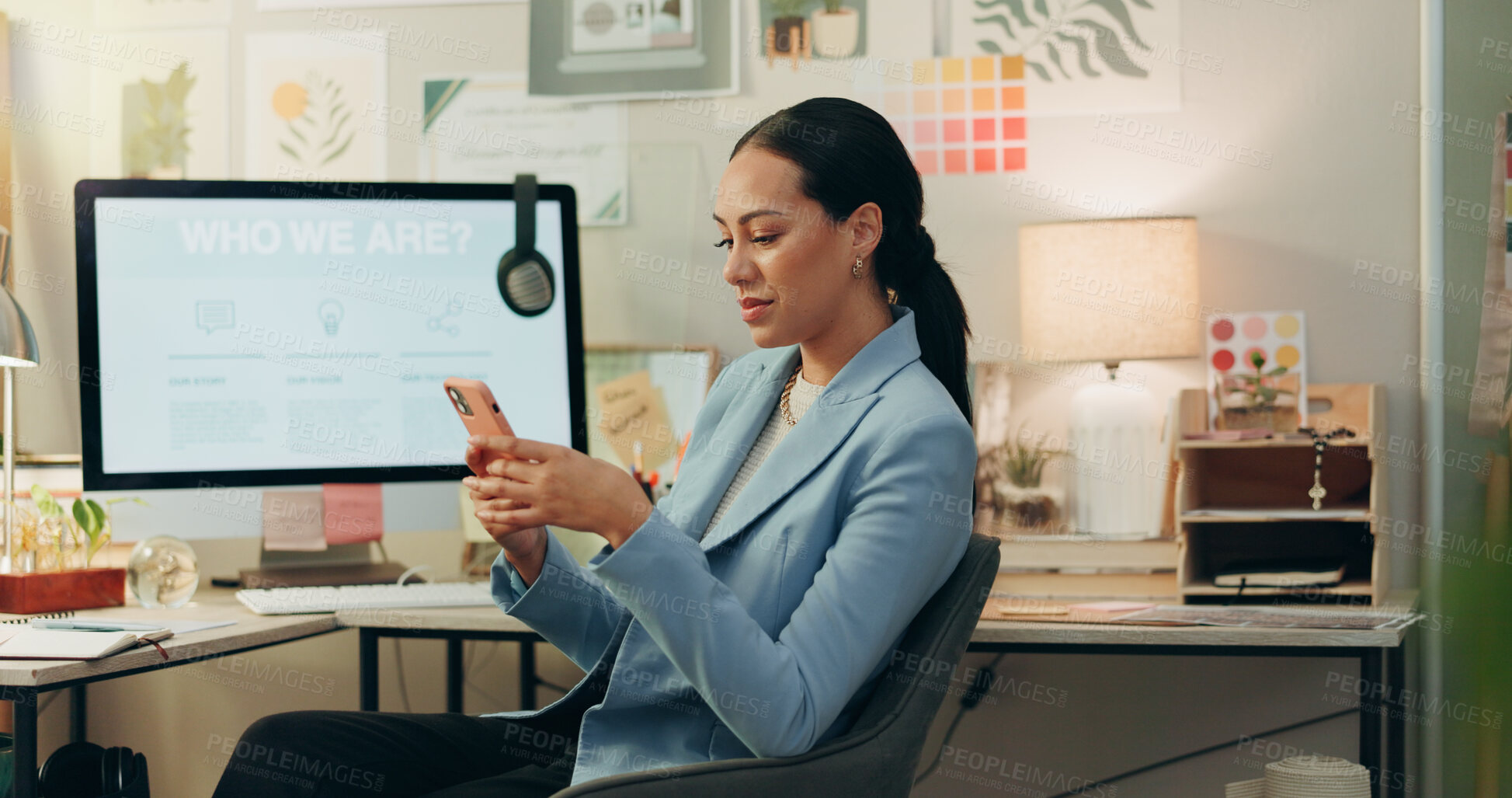 Buy stock photo Phone, happy and businesswoman in the office typing a text message on social media or the internet. Smile, technology and professional female creative designer scroll on cellphone in the workplace.