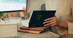 Bible, religion and hands of person reading holy Christian book to worship God for spiritual learning and trust. Faith, knowledge and person with peace due to scripture, praise and gratitude in home