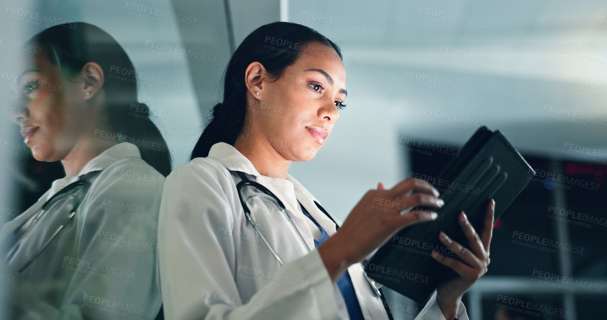 Buy stock photo Doctor, woman and tablet at night with medical, healthcare and clinic data for research. Female professional, employee and telehealth with online consulting on a web app for wellness and planning
