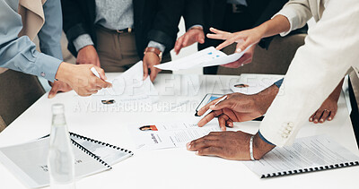 Business people, hands and paperwork at meeting with company information and project. Collaboration, office document and sales report of staff with teamwork, cooperation and planning with data