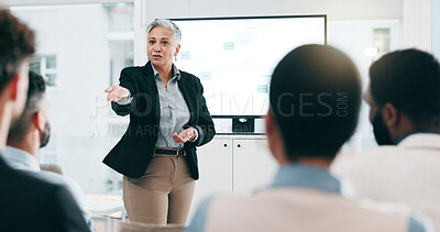 Business people, feedback and woman with presentation, seminar and questions with partnership, corporate training and discussion. Presenter, speaker and audience in a workshop, learning and crowd
