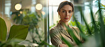 Woman, employee and business portrait in an office for environment, sustainability and nature. Confident, female executive standing alone for marketing, strategy and leadership in green workplace