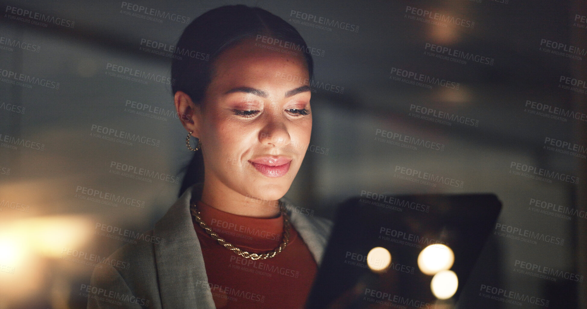 Buy stock photo Business woman, smile and tablet at night in office to search online report, scroll information and website planning. Happy corporate employee working late on digital data, tech or social network app