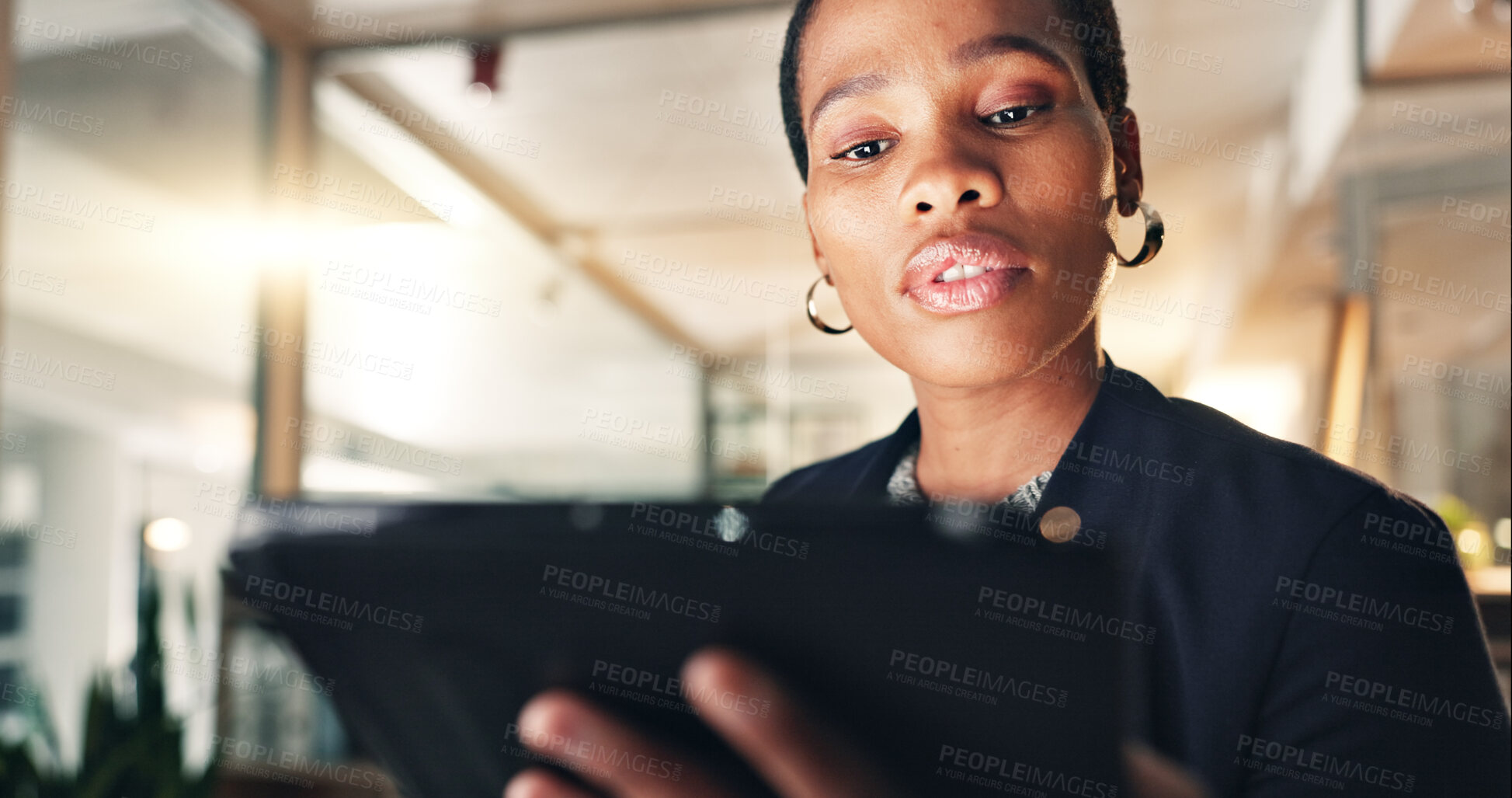 Buy stock photo Business, black woman and tablet at night in office to search internet, scroll information and planning website. Face of serious employee working late on digital tech, online data or social media app