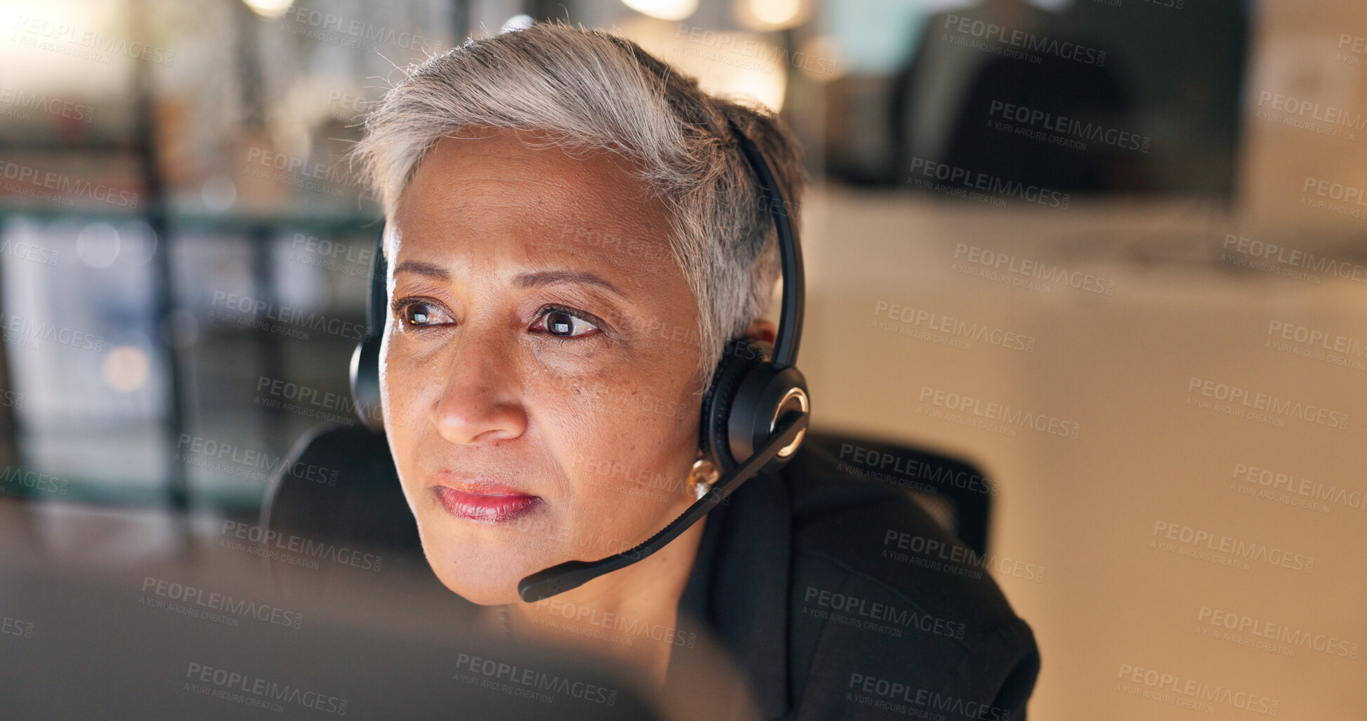 Buy stock photo Call center, woman and consultant in office at night for online consultation with overtime. Reading, technology and senior female agent with technical support, customer service or telemarketing job.