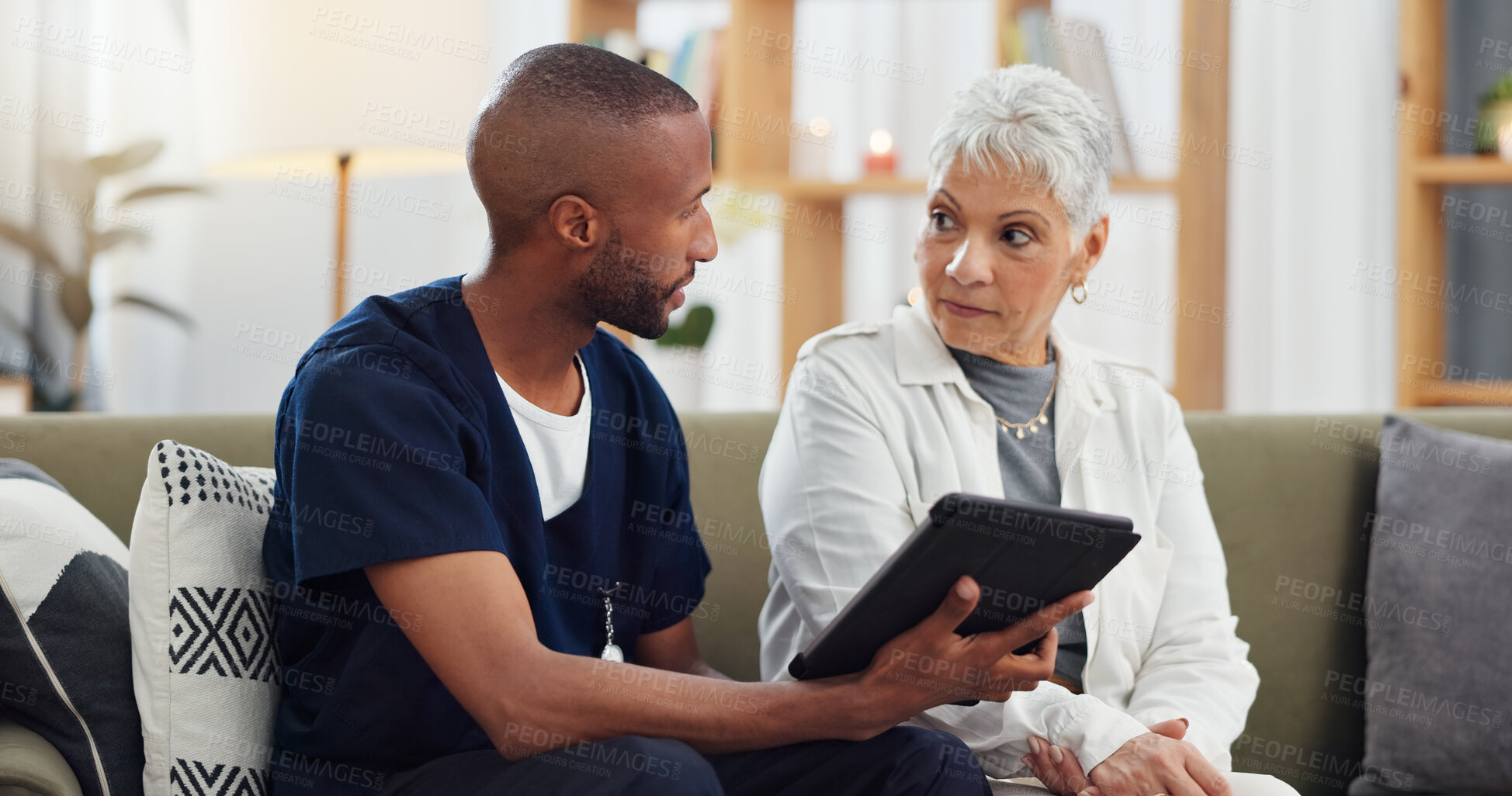 Buy stock photo Elderly woman, man and tablet, caregiver with patient for healthcare and medical information or help with social media. Support, African nurse for senior care and tech, telehealth and how to work app