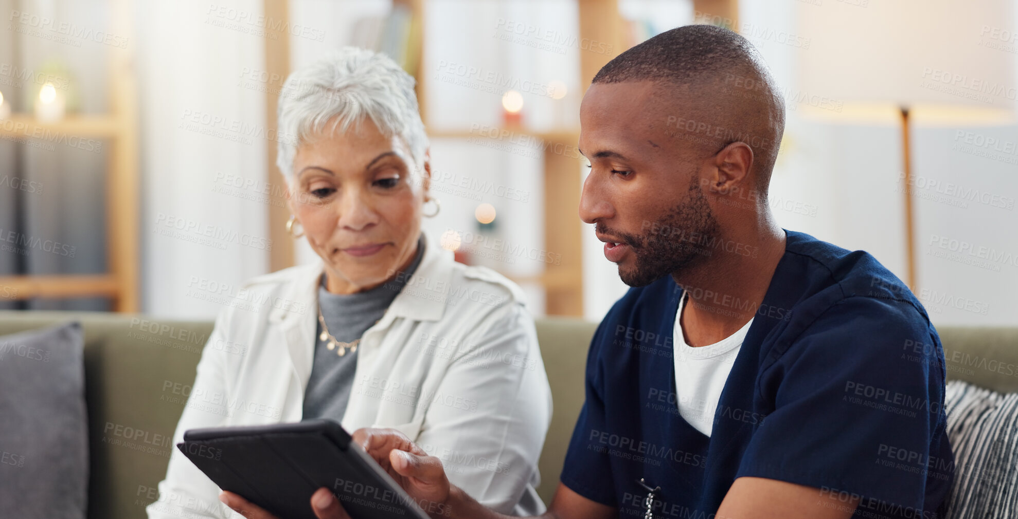 Buy stock photo Elderly woman, man and tablet, nurse with patient for health and medical information or help with social media. Support, African caregiver for elderly care and tech, telehealth and how to work app