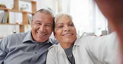Senior couple, selfie and living room at home with smile, love and care together on a sofa. Social media, happy and face in a lounge with support and laughing in retirement with marriage on a couch