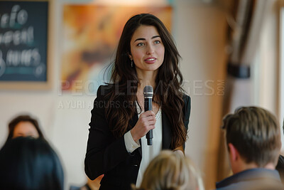 Businesswoman, conference or speaker sharing information at a business seminar for knowledge, motivational or coaching. Confident, woman or coach speaks to audience at a convention or corporate event