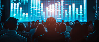 Group, conference or people sharing information at a business seminar for information or presentation. Back view of audience looking at a screen with graphs at a trading convention or corporate event