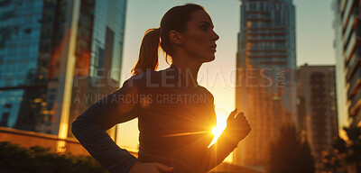 Woman, running and athlete on a morning run in the city for training, fitness and workout. Confident, determined and focused female jogging at sunrise for marathon training, competition or exercise