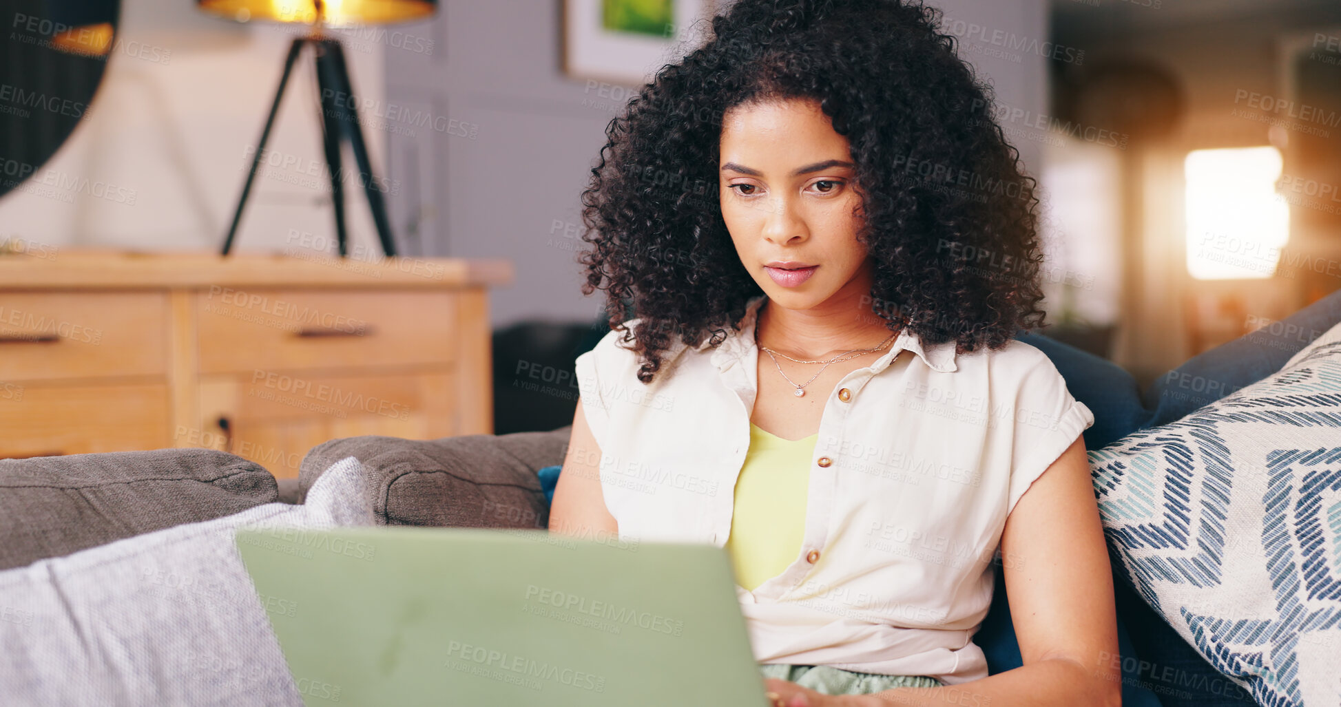 Buy stock photo Woman, remote work and thinking on sofa with laptop to update blog post, social media or reading digital research. Freelancer, computer and ideas for elearning, online course or download subscription