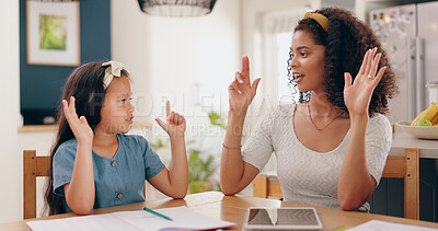 Mother, child and high five for education in home with success, support or achievement at dining table. Family, girl and parent with happiness and celebration for academic victory, or learning growth