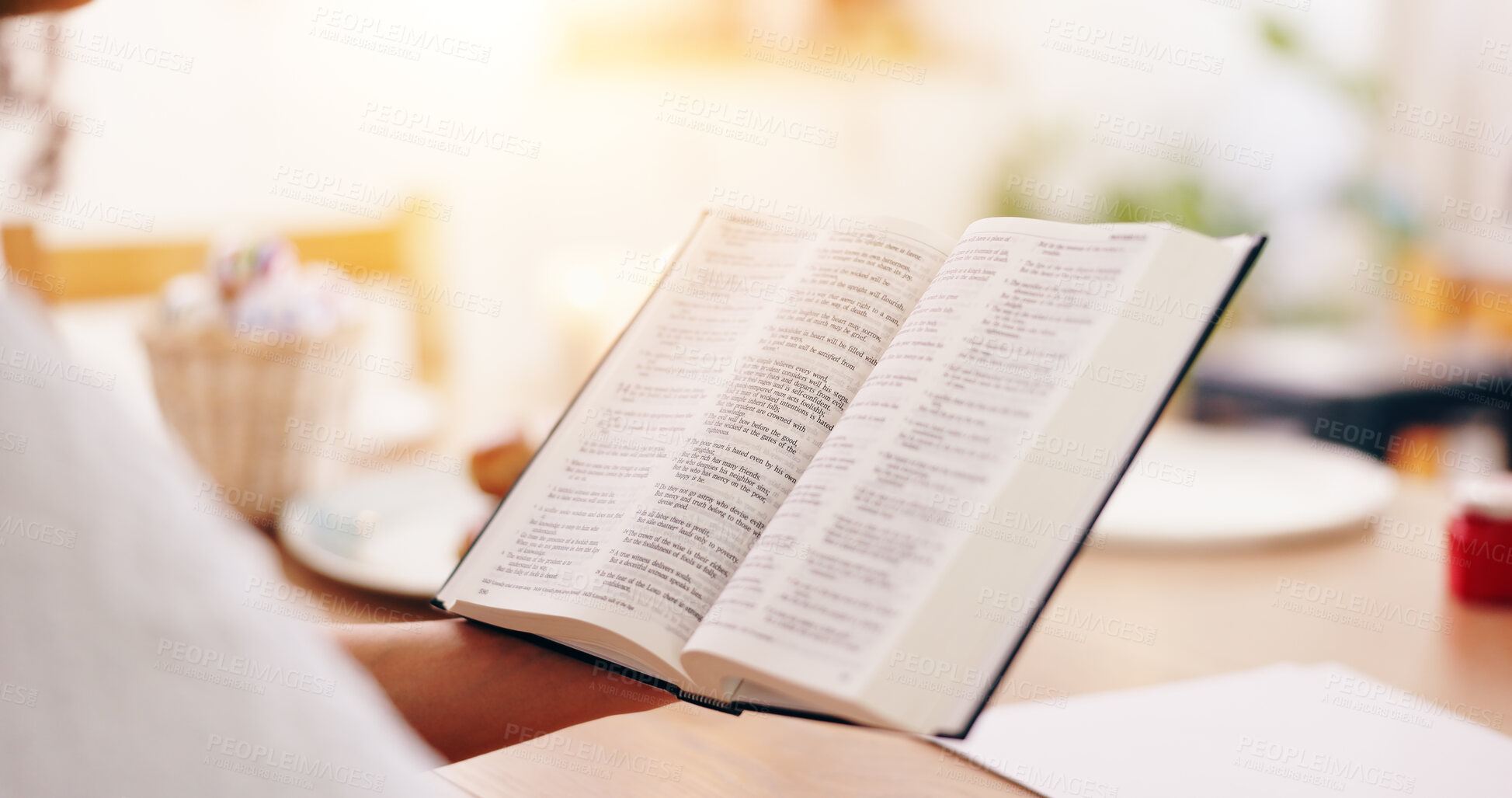 Buy stock photo Person, bible book and point with hands, reading or studying for praise, worship or faith in home. Knowledge, closeup and information with religion, learning or spiritual guide for connection to God