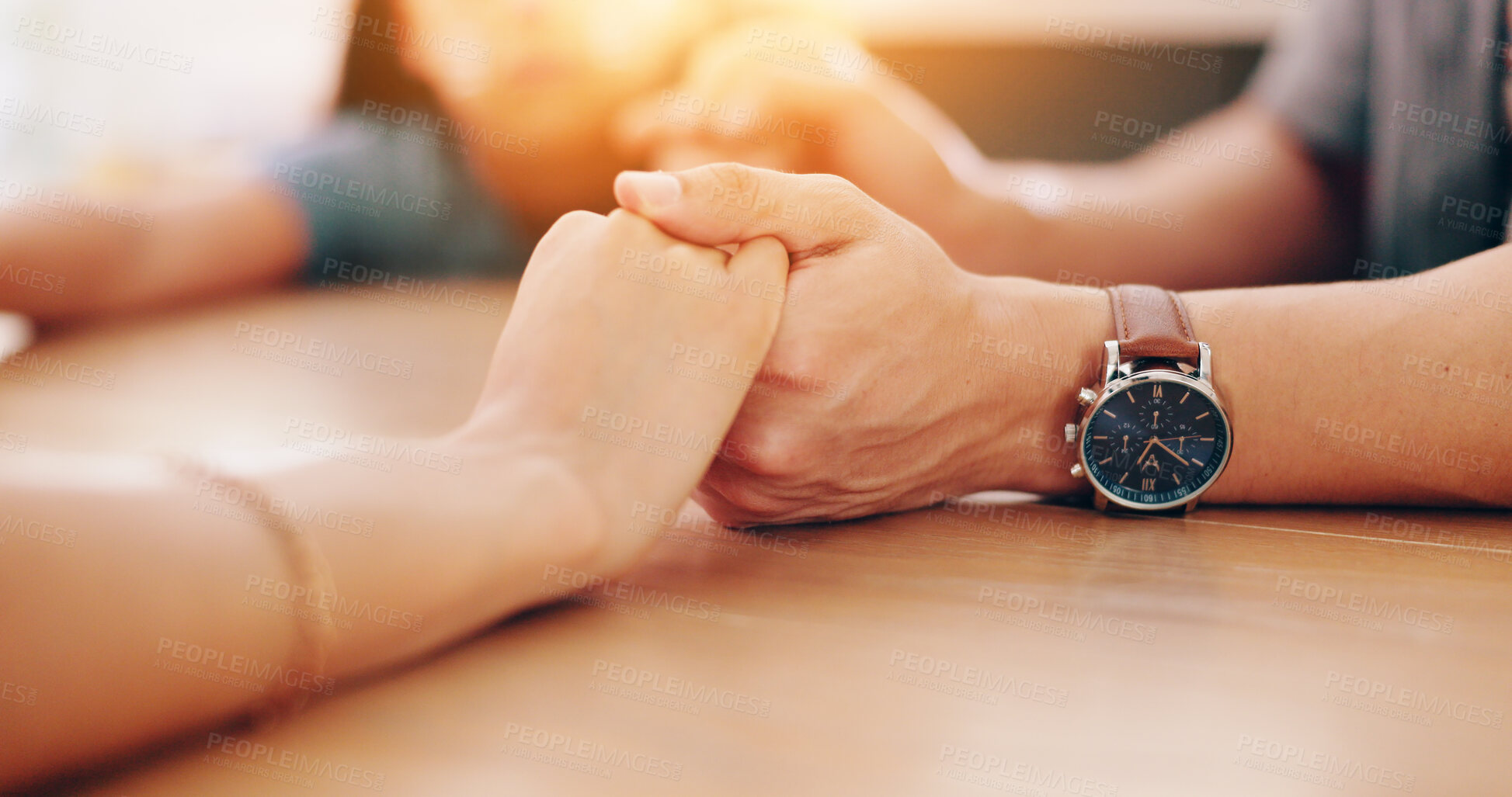 Buy stock photo Family, holding hands and praying at table in home for faith in God, spiritual or gratitude with trust. Prayer, people or closeup of religion, understanding and thankful for blessing, grace or Christ