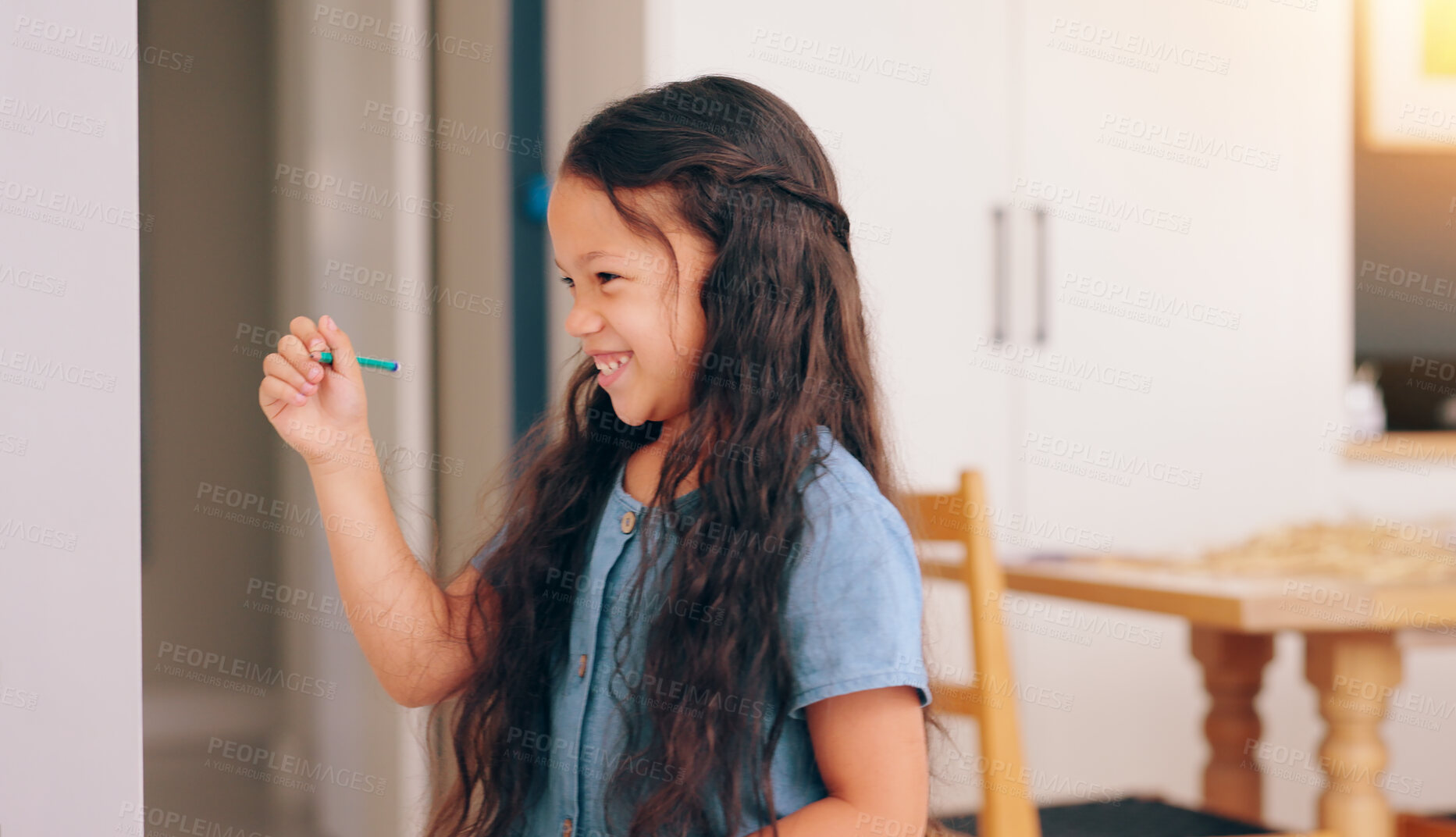 Buy stock photo Angry mom, girl child and discipline for writing on wall, shouting and sad for mistake in family home. Kid, mother and daughter with pointing, pencil and talking with drawing in living room at house