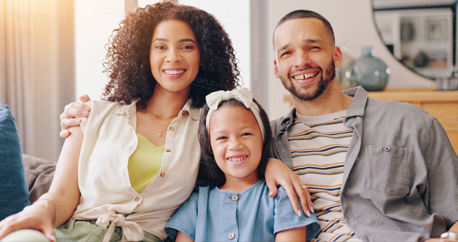 Buy stock photo Portrait of mom, dad and kid on couch with smile, love and bonding together in living room of home. Face of happy family with father, mother and daughter sitting on sofa, relax and embrace in lounge.