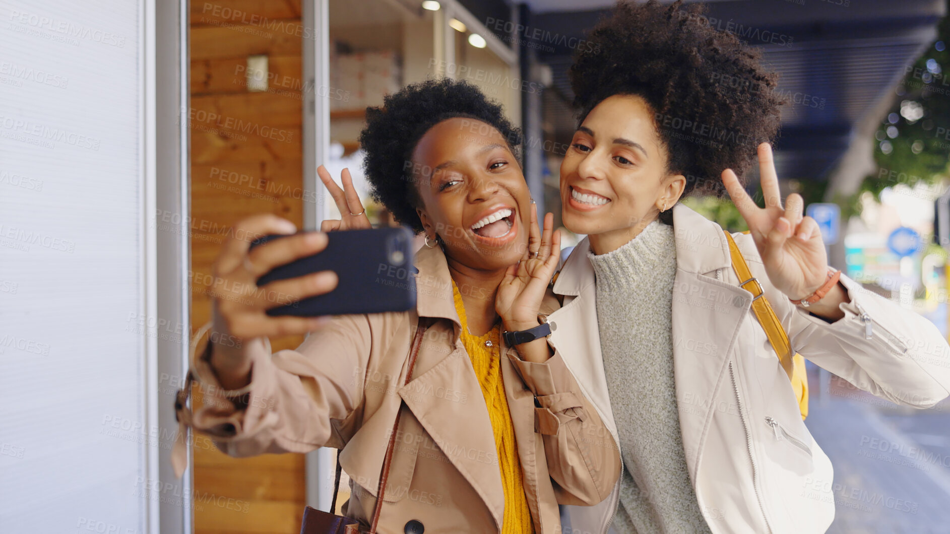 Buy stock photo African, friends and happy selfie in city with phone for photography and memory on social media. Peace, sign and women smile with emoji for post online, blog or virtual communication on smartphone