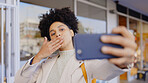 Woman, blowing kiss and selfie in city for photography, social m