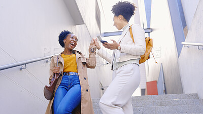 Buy stock photo Happy, high five and friends with phone outdoor on stairs in city with celebration of success or achievement. Excited, women and support for announcement of college news, information or notification