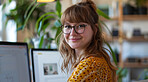 Computer, business and woman in an office for marketing strategy, data analysis and infographics on screen. Happy, confident and American sitting at her desk for finance, professional and technology