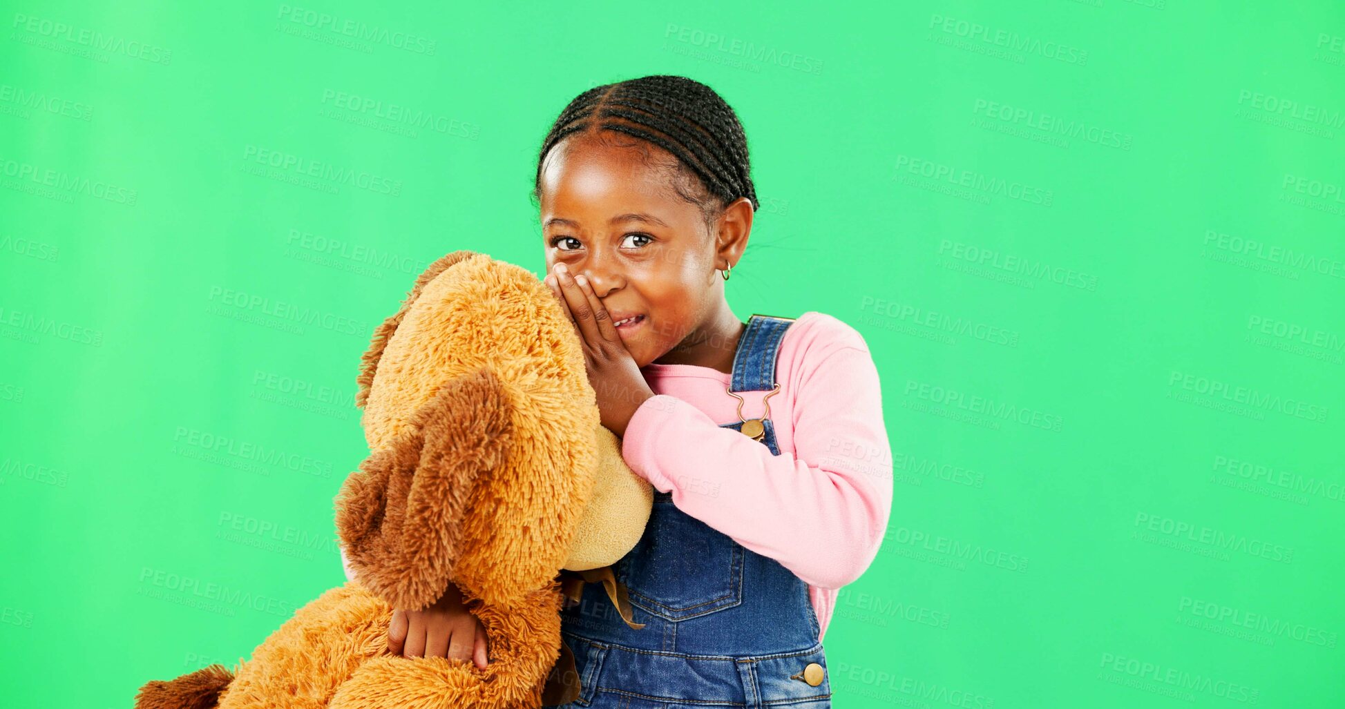 Buy stock photo Child, teddy bear and smile by green screen in portrait for whisper, gossip or story with mockup for promo. African girl, kid and happy with toys for talk, secret or playful with conversation in game