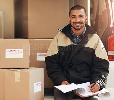 Buy stock photo Portrait of a delivery man sitting in the back of his van full of boxes