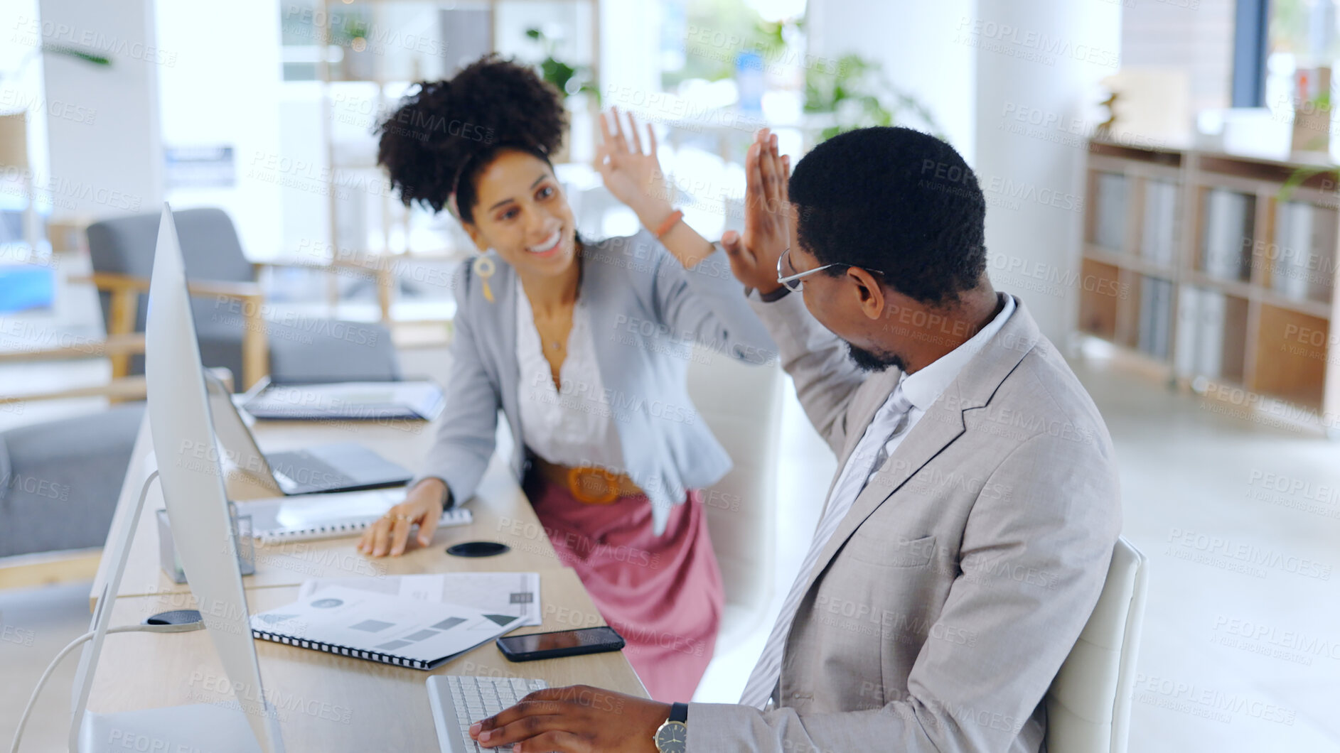 Buy stock photo Excited, business people and high five with documents at office for team, success or achievement. Happy man and woman employee or colleagues touching hands for winning, promotion or deal at workplace