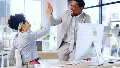 Buy stock photo Happy, business people and high five with computer at office for team success or achievement. Excited man and woman employee or colleagues touching hands for winning, promotion or deal at workplace