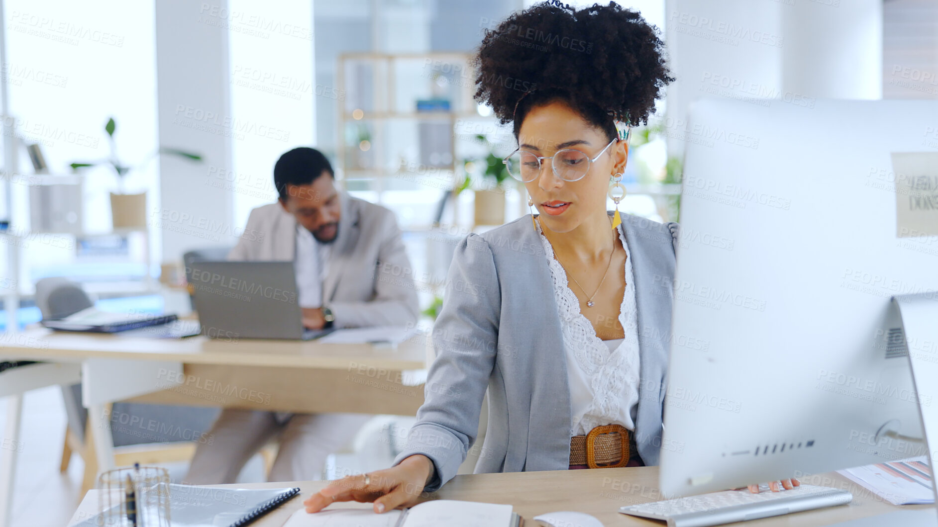 Buy stock photo Computer, notebook and business woman reading in office, planning or research in creative startup. Copywriter, notes and serious professional with information for article, blog or schedule in journal